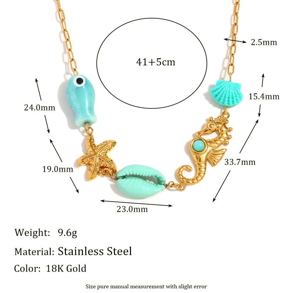 Ocean Eyes Pendant Necklace – Seahorse, Shell & Starfish in 18K Gold